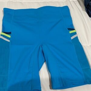 Fabletics Teal Blue Women's Bike Shorts with Neon Stripe Accents